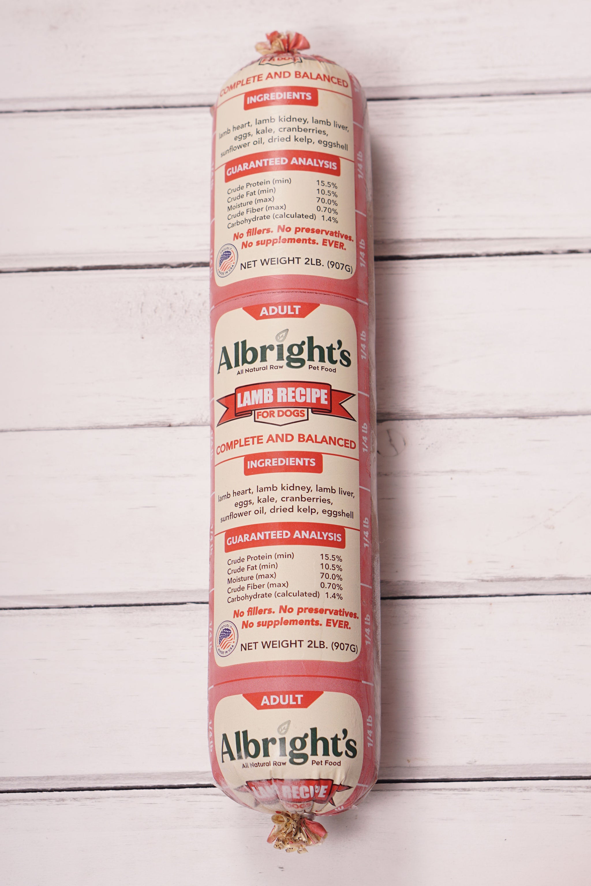 Albright's dog food roll on a wooden surface