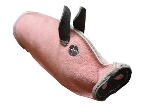 Pink pig-shaped object on a white background