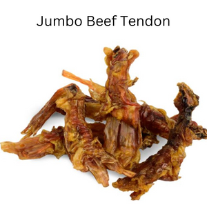 Dried beef tendon strips scattered on a white background, representing a natural and protein-rich dog treat.